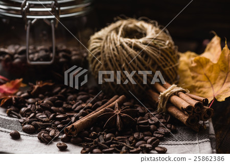 Autumn spices and some kitchenware on towel. Autumn spices and some kitchenware on towel. 25862386