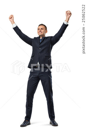 Happy businessman in celebrating pose isolated on Happy businessman in celebrating pose isolated on 25862522