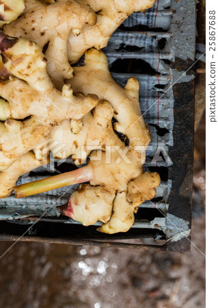 selling fresh ginger on the street  25867688