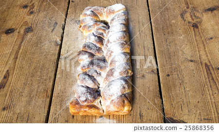 Strudel on a Wooden Table 25868356