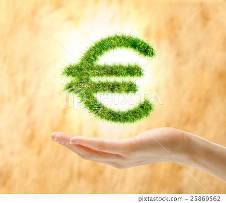Female hand holding euro sign made of grass 25869562