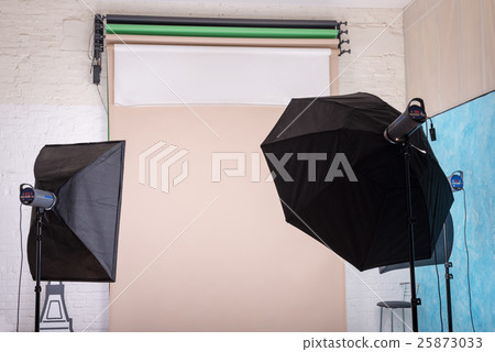 Empty photo studio with lighting equipment and 25873033