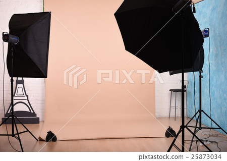 Empty photo studio with lighting equipment and 25873034