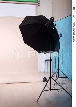 Empty photo studio with lighting equipment and 25873035