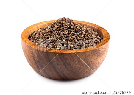 Decorticated cardamom seeds in a bowl 25876779