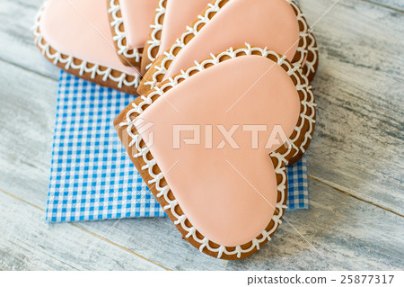 Heart shaped biscuits on napkin. 25877317
