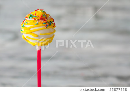 Dessert with sprinkles. 25877558