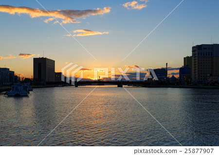 Sunset of Kushiro Harbor in Autumn and Buddhist Bridge Sunset of Kushiro Harbor in Autumn and Buddhist Bridge 25877907