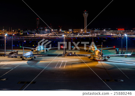 Image of an airplane anchored at the airport Night 25880246