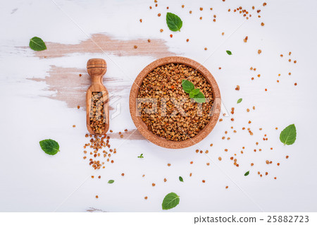 Raw organic bee pollen on shabby wooden. 25882723