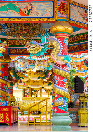 Golden Chinese dragon wrapped around red pole Golden Chinese dragon wrapped around red pole 25882732