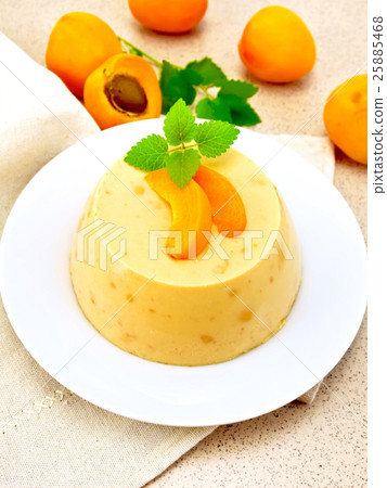Panna cotta apricot with fruit on table Panna cotta apricot with fruit on table 25885468