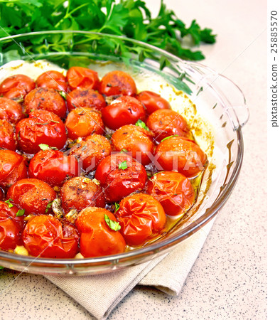 Tomatoes baked on granite table 25885570