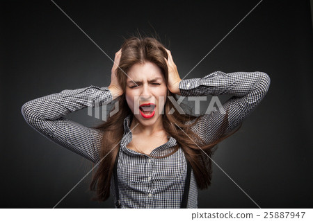 Woman screaming because of headache. Woman screaming because of headache. 25887947