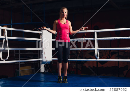 Woman with jumping rope Woman with jumping rope 25887962