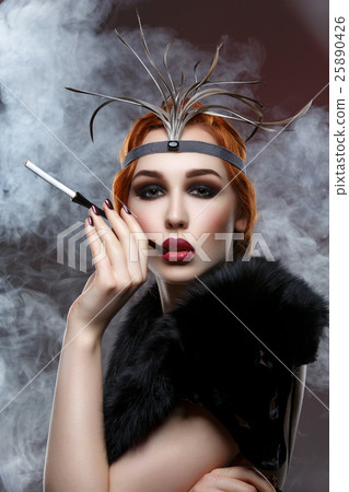 Beautiful girl with smoky eyes and red lips Beautiful girl with smoky eyes and red lips 25890426