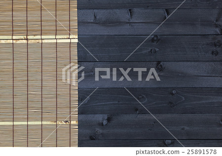 Bamboo mat on wooden table, top view Bamboo mat on wooden table, top view 25891578