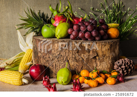 Still life with on the timber full of fruit. 25891672