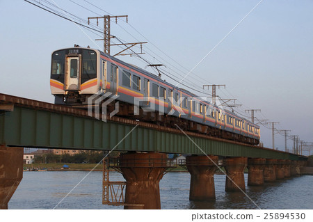 Echigo Line E129 system crossing the Shinano River Bridge 25894530