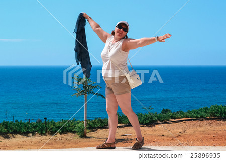 straightened hands on the beach 25896935