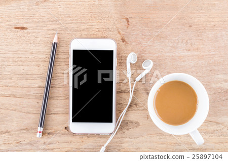 Mobile phone on wood table background, clipping path inside Mobile phone on wood table background, clipping path inside 25897104