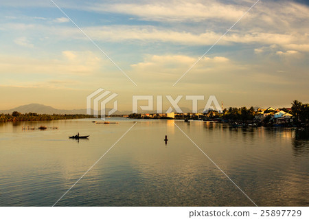 Fisherman is fishing in sunrise at Thu Bon river Fisherman is fishing in sunrise at Thu Bon river 25897729
