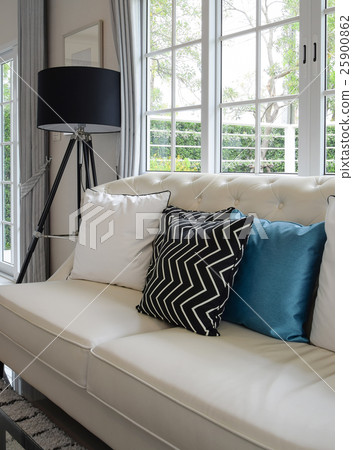 white and blue pillows on a couch in living room white and blue pillows on a couch in living room 25900862
