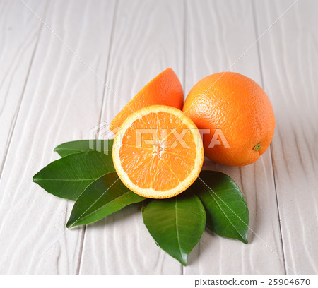 Fresh orange on white wooden background Fresh orange on white wooden background 25904670