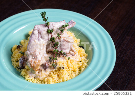 Stewed rabbit meat in creamy sauce with herbs and Stewed rabbit meat in creamy sauce with herbs and 25905321