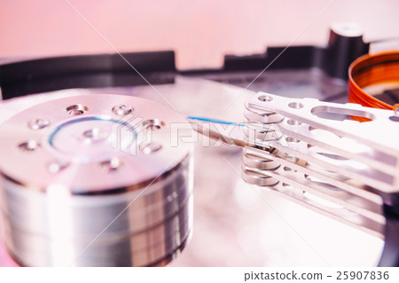 Internal hard disk closeup on wooden background Internal hard disk closeup on wooden background 25907836