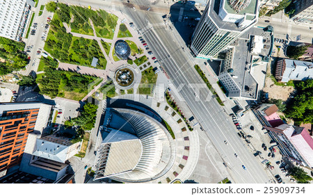 Aerial city view with roads, houses and buildings. 25909734
