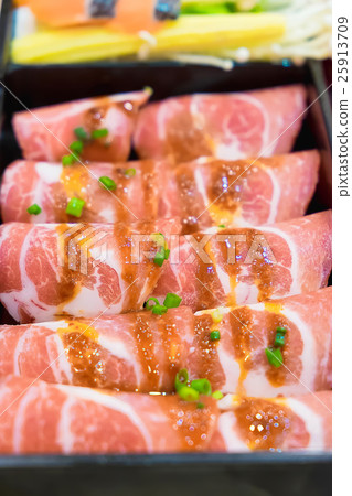 Raw kurobuta pork slices on plates, for sukoyaki Raw kurobuta pork slices on plates, for sukoyaki 25913709