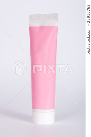 Pink tubes for cream on gray background 25913762