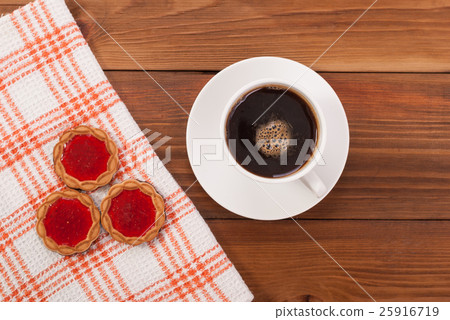 Coffee and biscuits with filling. Coffee and biscuits with filling. 25916719