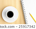 cup of black coffee with notepad and pencil 25917342