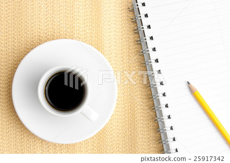 cup of black coffee with notepad and pencil cup of black coffee with notepad and pencil 25917342