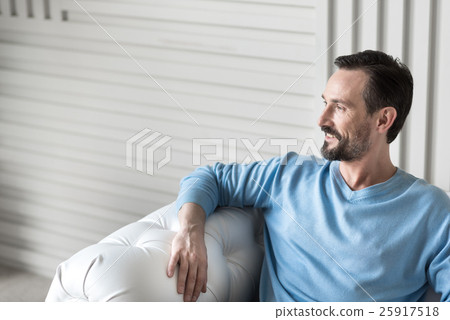 Joyful bearded man being in a great mood Joyful bearded man being in a great mood 25917518