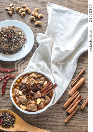 Thai Massaman Curry on the wooden background 25918599