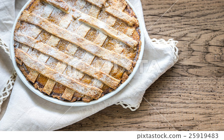 Pumpkin pie on the wooden background 25919483