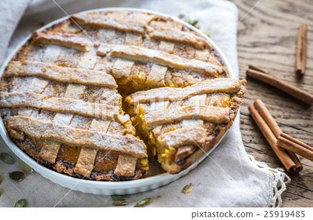Pumpkin pie on the wooden background 25919485