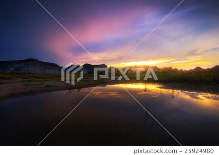 Twilight sky with mountain landscape view reflects 25924980