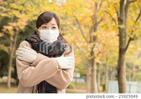 A woman in a coat A woman in a coat 25925049