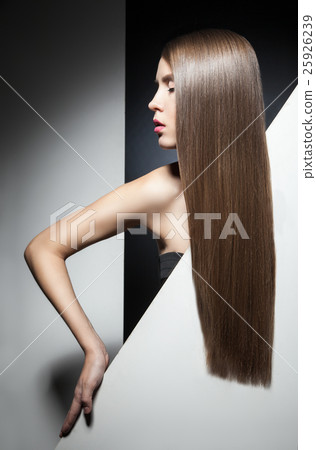 Close-up of model with perfect shining long hair 25926239