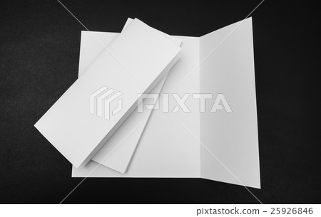 Trifold white template paper on black background . Trifold white template paper on black background . 25926846