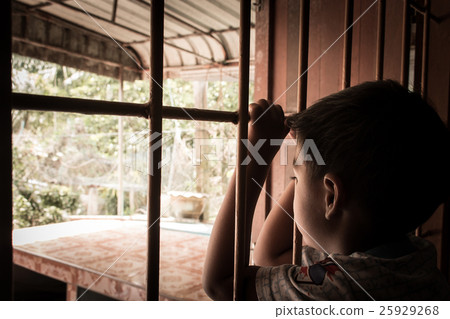 little boy Hand in jail looking out the window little boy Hand in jail looking out the window 25929268