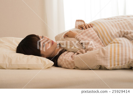 A woman sleeping A woman sleeping 25929414