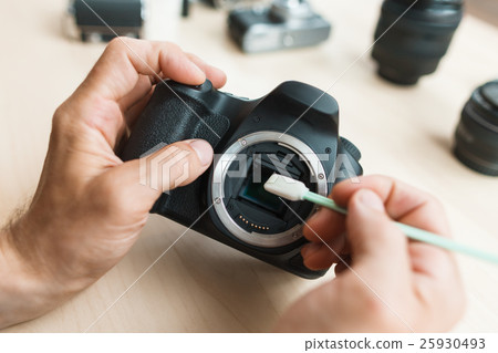 Close-up of camera matrix cleaning, technician pov 25930493