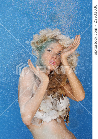 charming woman with beautiful hair and snow 25933036