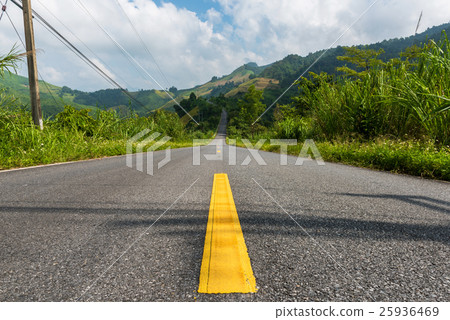 照片素材(图片): winding paved road in the mountain.
