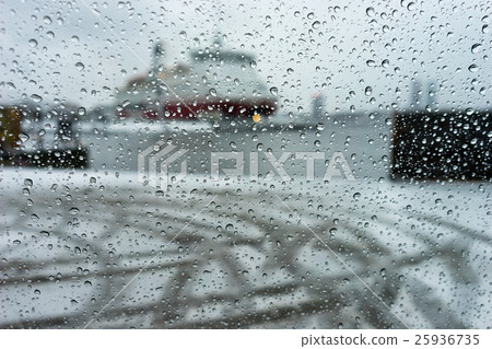 Ship in the port through the raindrops on glass 25936735